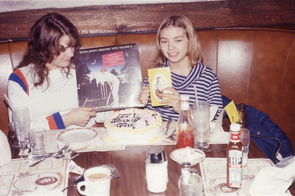 Astrid Blodgett with daughter Elizabeth and Elton John