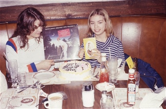 Astrid Blodgett with daughter Elizabeth and Elton John